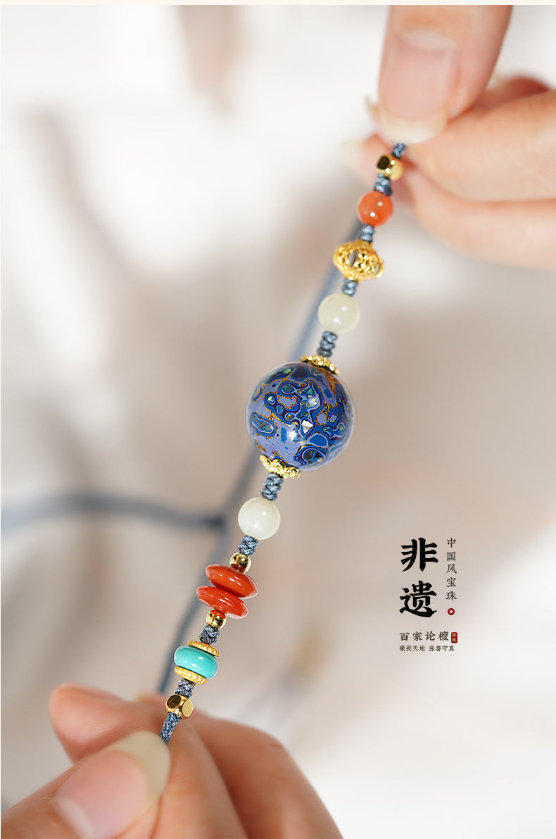 Collier en perle sculptée de forme ronde, disponible aux couleurs rouge / bleu / orange / noire laquée de Pékin