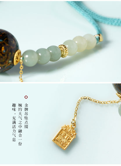 Collier en perle sculptée de forme ronde, disponible aux couleurs rouge / bleu / orange / noire laquée de Pékin